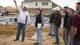 Construction science students tour the subdivision.